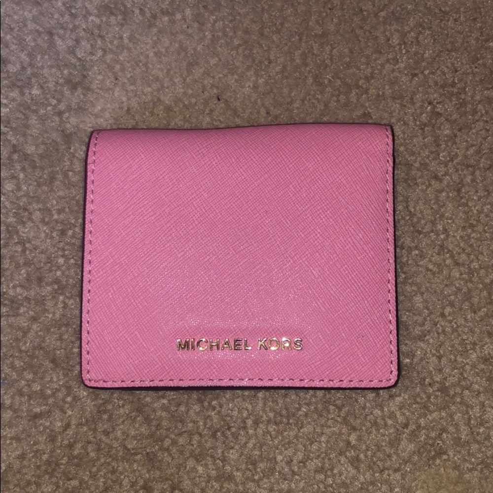 Pink Michael Kors folding wallet